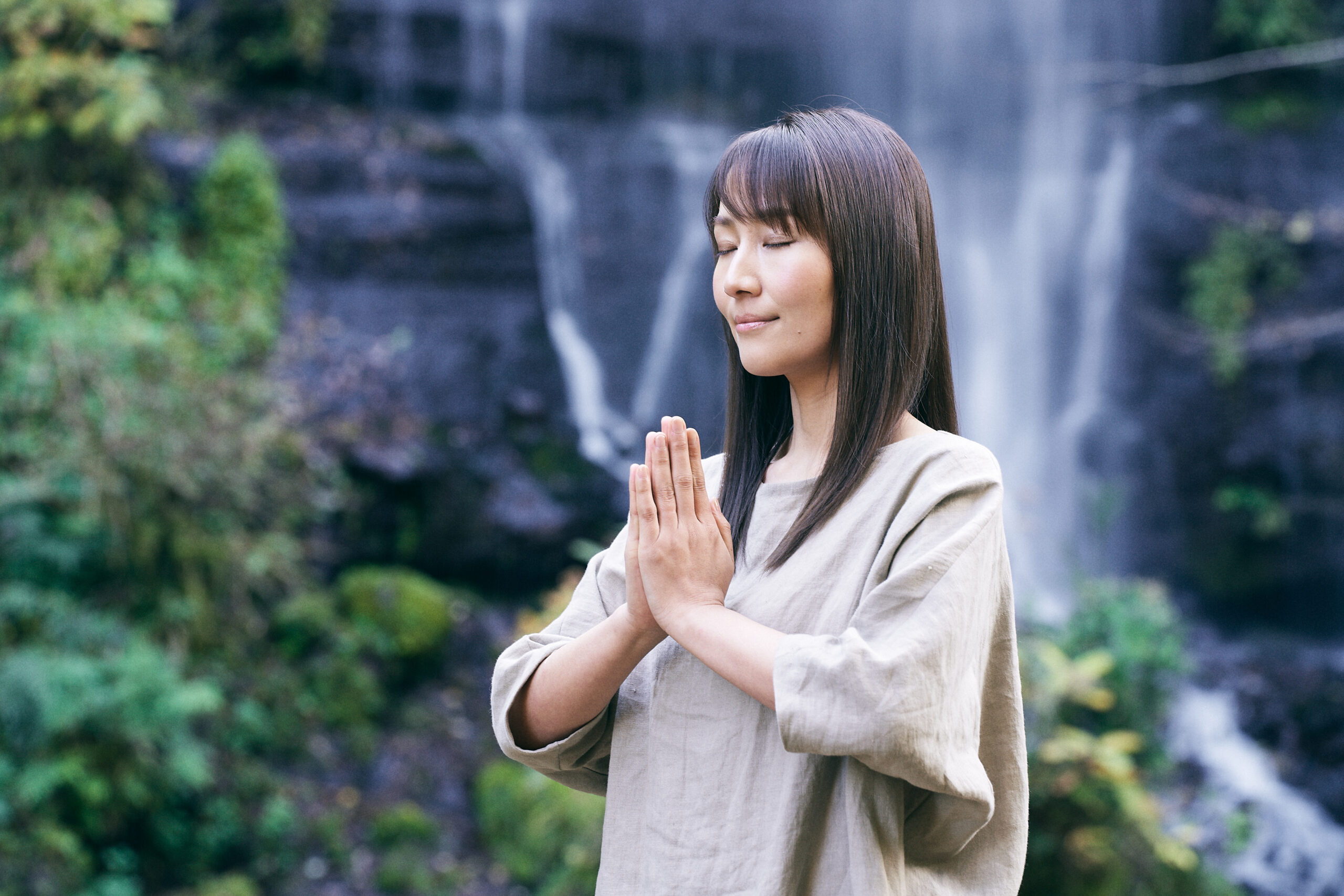 Waterfall meditation as part of a Japan spiritual retreat power spot experience