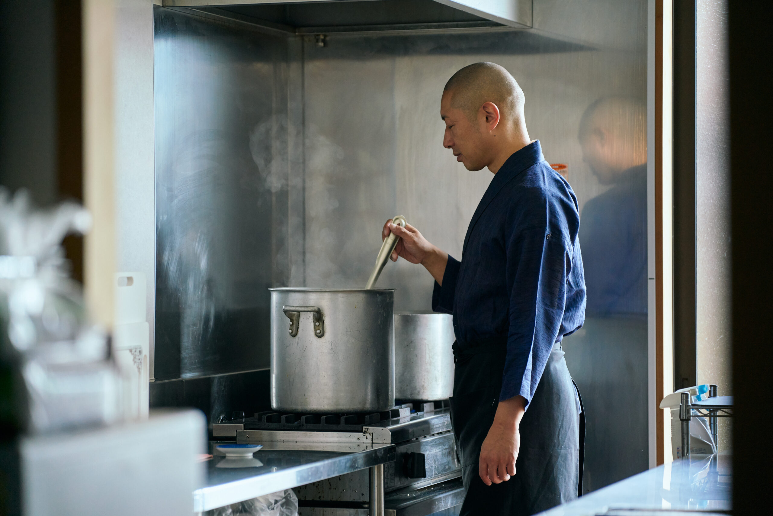 Soto Zen tenzo monk preparing shojin ryori temple cuisine at dawn 