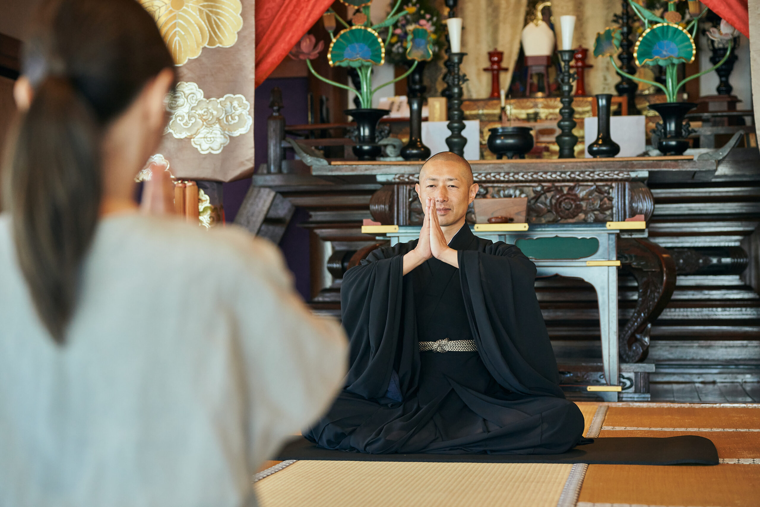 Soto Zen monk practicing zazen meditation inside a Japanese temple hall