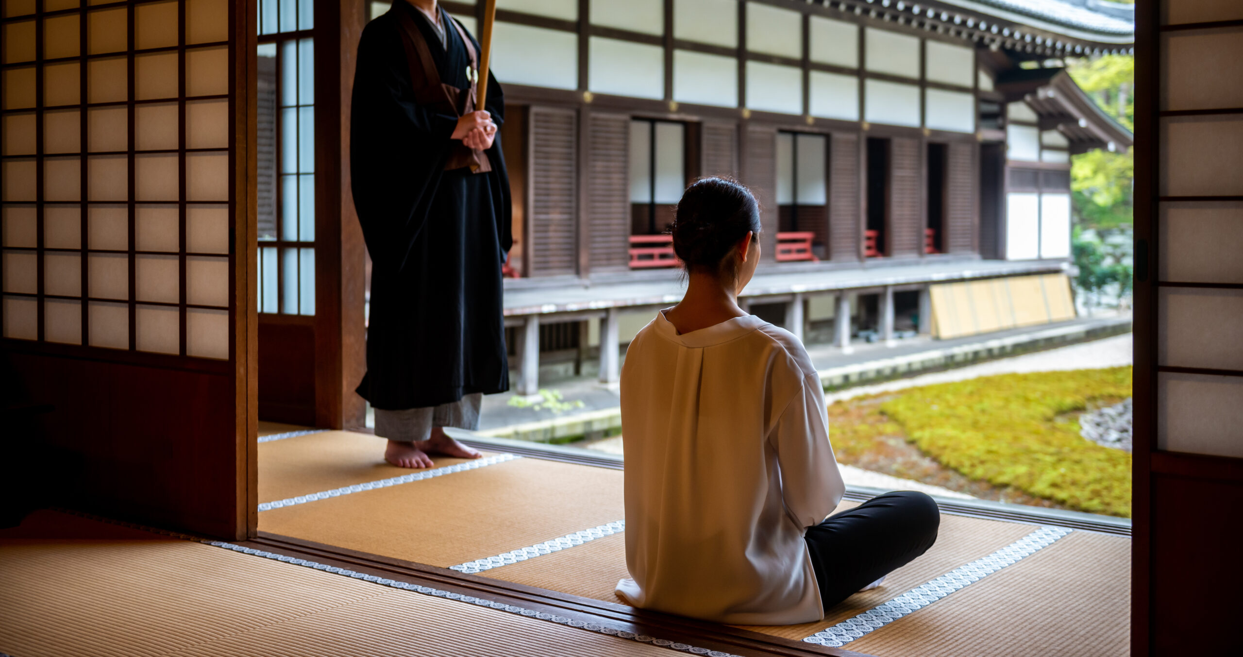 participants of a Zen retreat in Japan sharing peaceful smiles after meditation practice